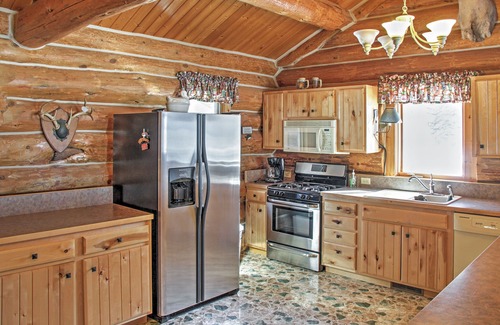 Oslund House | Beautiful Sand Lake Retreat with Expansive Porch & Spa