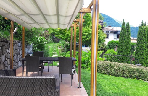 Cerano d'Intelvi Apartment | Wonderful living in villa in the garden. View of mountains, lake, many attractions.