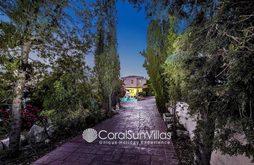 Peyia Town Villa | Serene Retreat with Private Pool and Colorful Garden