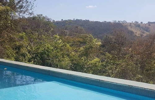 Moeda House | Cozy Retreat with Scenic Views and Family-Friendly Amenities