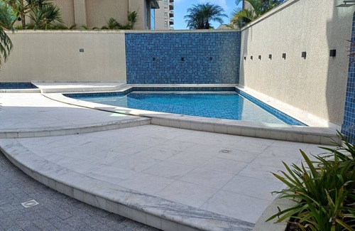 Jardim Centenario Apartment | Wonderful view of Enseada Beach. Gourmet and Pet Friendly Balcony