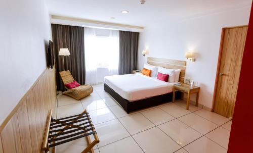 Bidadi Resort | Discover Wonderla Resort: Oceanfront Stay with Pool Access