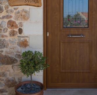 Tsikalaria Apartment | Experience Wood and Stone: Family-Friendly 4-Star Retreat