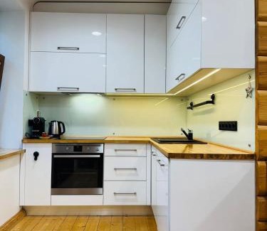 Centrs Apartment | Cozy Country Lodge in the City with Top Amenities