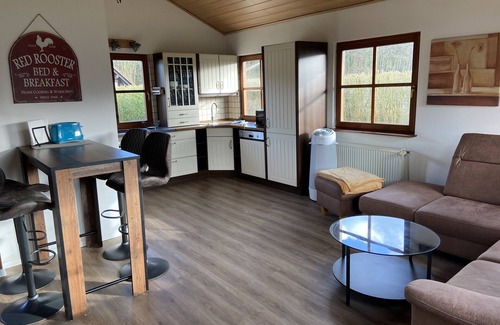 Birgelen House | Inviting Wooden House on Meinweg with Serene Garden Retreat