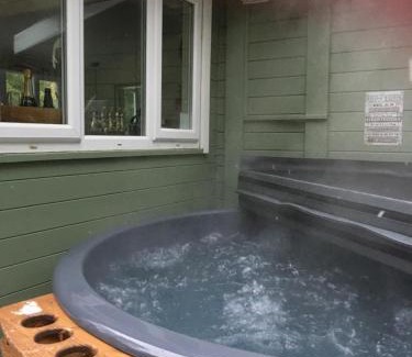 Tilford Cabin | Cozy Woodland Cabin with Private Hot Tub & Pet-Friendly Stay