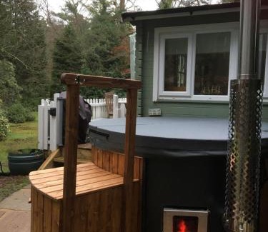 Tilford Cabin | Cozy Woodland Cabin with Private Hot Tub & Pet-Friendly Stay