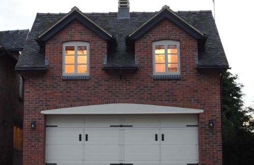 Uttoxeter House | Discover Woodleighton Cottages: 5-Star Family Retreat