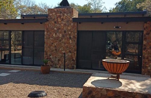 Leeupoort Villa | Exceptional Woodpecker Villa Guesthouse with Hot Tub Access