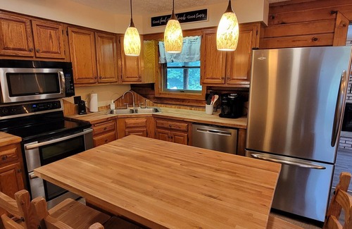 Farmington Cabin | Woodside Escape: Pet-Friendly Retreat with Hot Tub & Yard