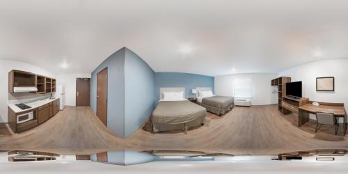 Charlotte Hotel | Convenient WoodSpring Suites near Charlotte University Research