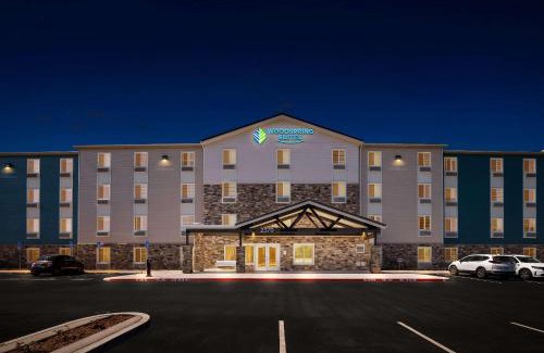 Corona Hotel | Convenient WoodSpring Suites Corona - Pet & Child Friendly