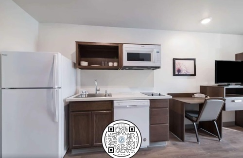 Plano Hotel | Pet-Friendly WoodSpring Suites Dallas Plano Central Awaits