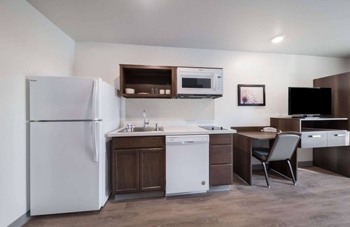Plano Hotel | Pet-Friendly WoodSpring Suites Dallas Plano Central Awaits