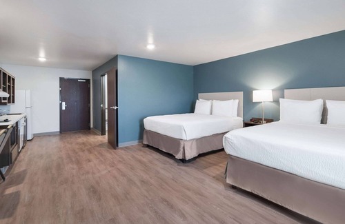 Plano Hotel | Pet-Friendly WoodSpring Suites Dallas Plano Central Awaits
