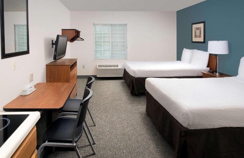 Gainesville Hotel | Budget-Friendly WoodSpring Suites Gainesville with Family Amenities