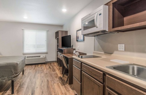 Keller Hotel | Cozy WoodSpring Suites in North Ft Worth with Great Amenities