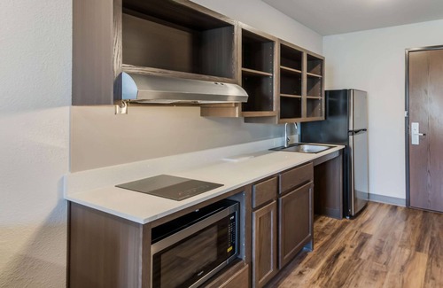 Round Rock Hotel | Comfortable WoodSpring Suites Round Rock with Essential Amenities