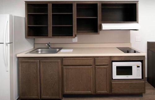 Round Rock Hotel | Comfortable WoodSpring Suites Round Rock with Essential Amenities