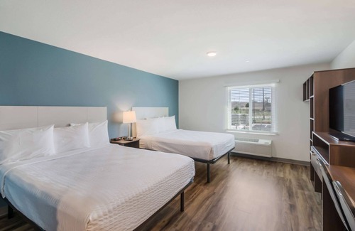 Round Rock Hotel | Comfortable WoodSpring Suites Round Rock with Essential Amenities