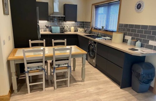 Dumfries Cabin | Relax at Woodview Lodge with Private Hot Tub & Breakfast