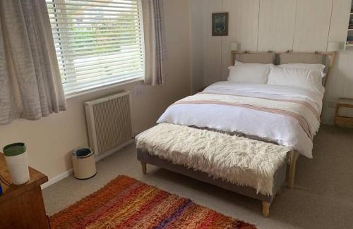 Mousehole House | Family-Friendly Retreat at Wootton Gray with Cozy Fireplace
