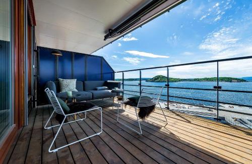 Gamle Oslo Apartment | Explore Wright Apartments - Sørenga with Oceanfront Views