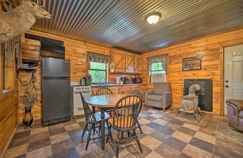 Golden Cottage | Forest View Cabin in Wright City with Fire Pit & Amenities