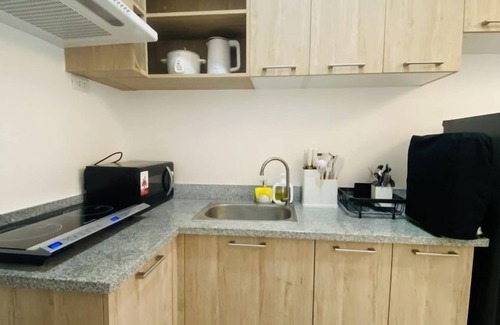 Mandurriao Apartment | WV Towers Studio with Balcony & Pool Access