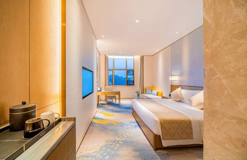 Maojian Qu Hotel | Top-Rated Wyndham Shiyan Downtown with Pool & Breakfast