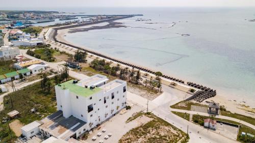Baisha House | Serene Oceanfront Retreat at Xiang Xie Min Su