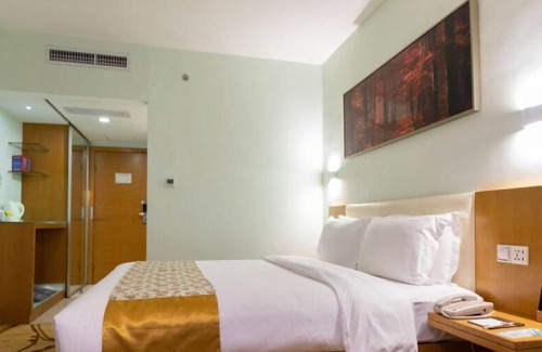 Huaqiang North Hotel | Xiaoyi Hotel Apartment