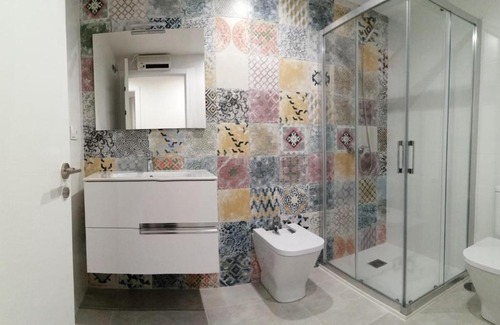 Fazouro Apartment | Discover Xuncos 1ºA: Oceanfront Retreat with Pool Access