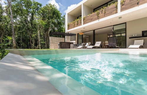 Xpu-Ha Villa | YaaX Villa: 4-Bedroom Escape with Beach Club Access