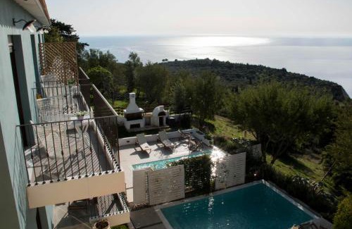 Athani Villa | Relax at Yades Villas: Oceanfront, Pet-Friendly Getaway