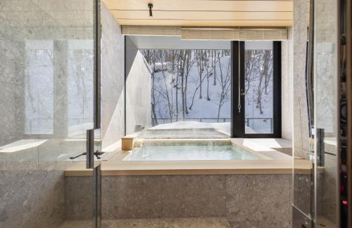Hirafu Apartment | YAMAKEI Residences: 4-Star Retreat with Hot Tub & Breakfast