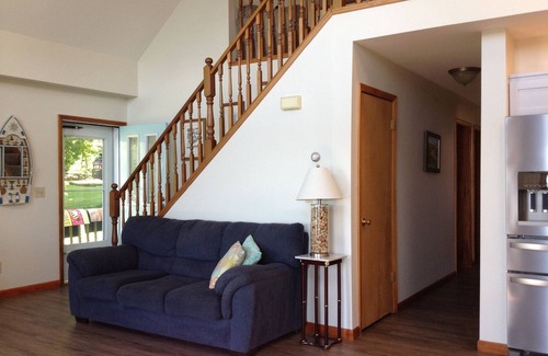 Town of Milo Cottage | Enchanting Lakefront Retreat with Pool and Spa Amenities