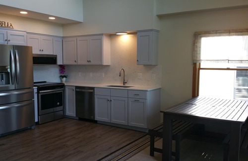 Town of Milo Cottage | Enchanting Lakefront Retreat with Pool and Spa Amenities