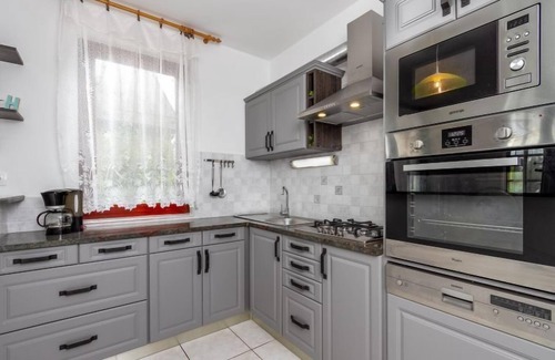 Balatonmariafurdo House | Oceanfront Getaway at Yellow 2 by Interhome