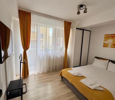 Floresti Apartment | Top-Rated Yellow Apartment - Child Friendly & Cozy Stay