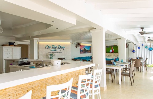 Saint Lawrence Hotel | Yellow Bird Hotel: Family-Friendly Oasis with Ocean Views