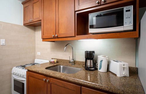 Saint Lawrence Hotel | Yellow Bird Hotel: Family-Friendly Oasis with Ocean Views