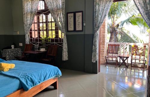 Tuy Hoa Hotel | Discover Trại Hoa Vàng Homestay: Pet-Friendly Bliss