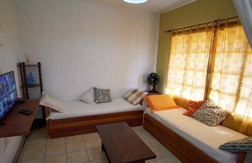 Garopaba House | Yellow House - 2 Suites in the Center