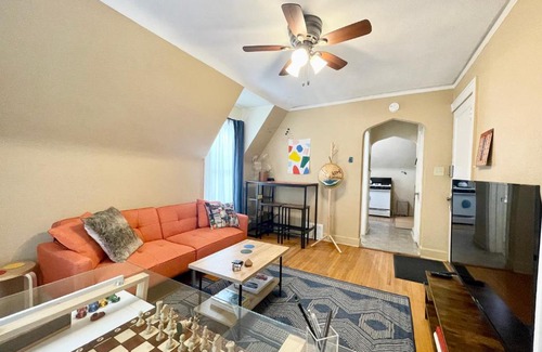 Minot Apartment | Cozy Yellow House Apartment with Self Check-in & Workspace