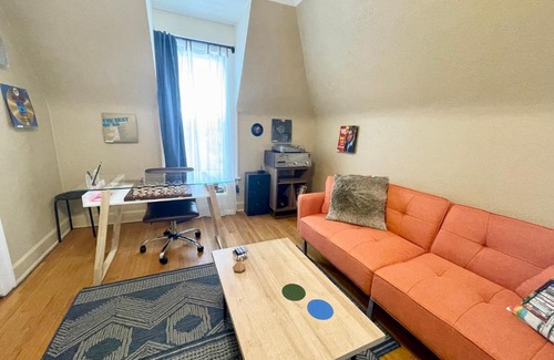 Minot Apartment | Cozy Yellow House Apartment with Self Check-in & Workspace