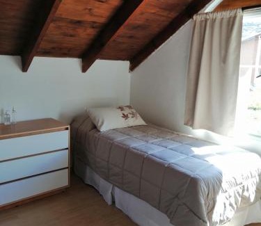 El Chalten House | Budget-Friendly Yellow House Cottage with Family Amenities