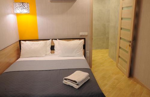 Sukhinovka Apartment | Yellow Loft: 2-Bedroom Getaway with Breakfast Included