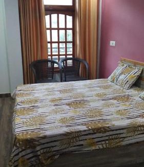 Rajgarh House | Cozy Yellow Valley Homestay: Family-Friendly with Kitchen