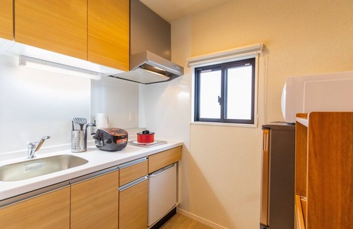 Ginowan Apartment | Top-Rated Yenn's Marina Inn with Oceanfront Views